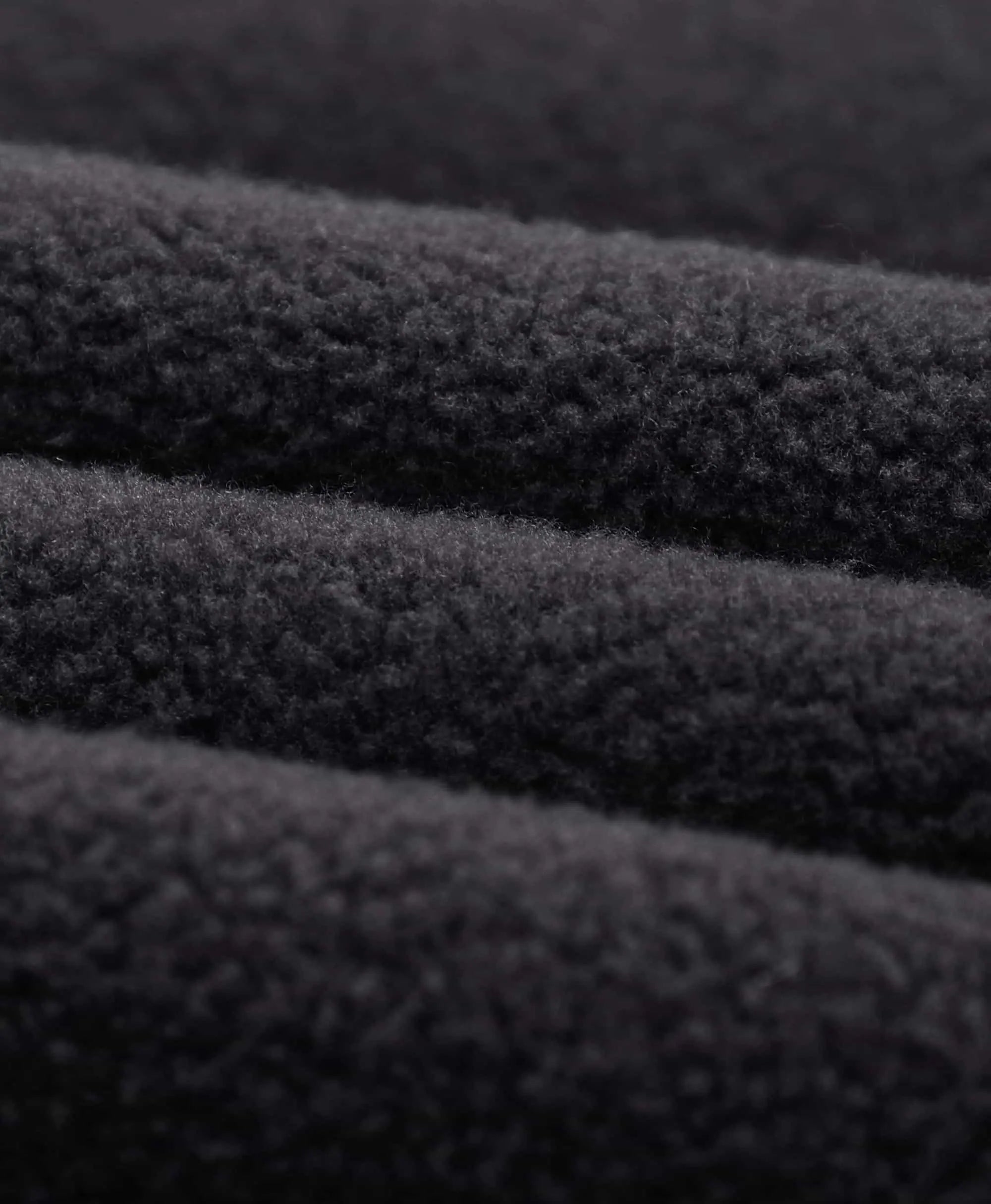 The scarf uses ultra-soft single-brush polar fleece